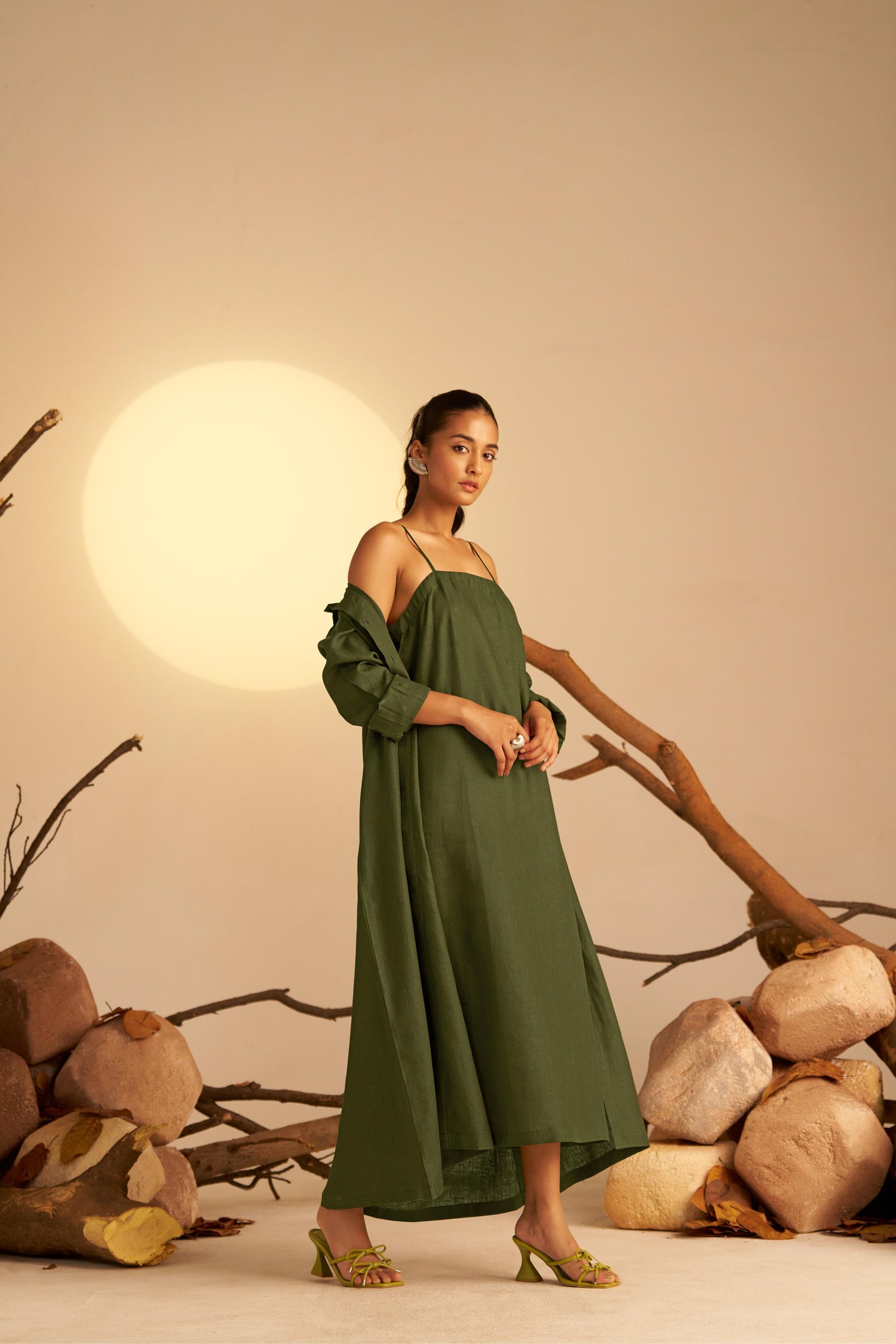 A Chic Two-In-One Ensemble Featuring A Sleek Olive Green Shirt Dress