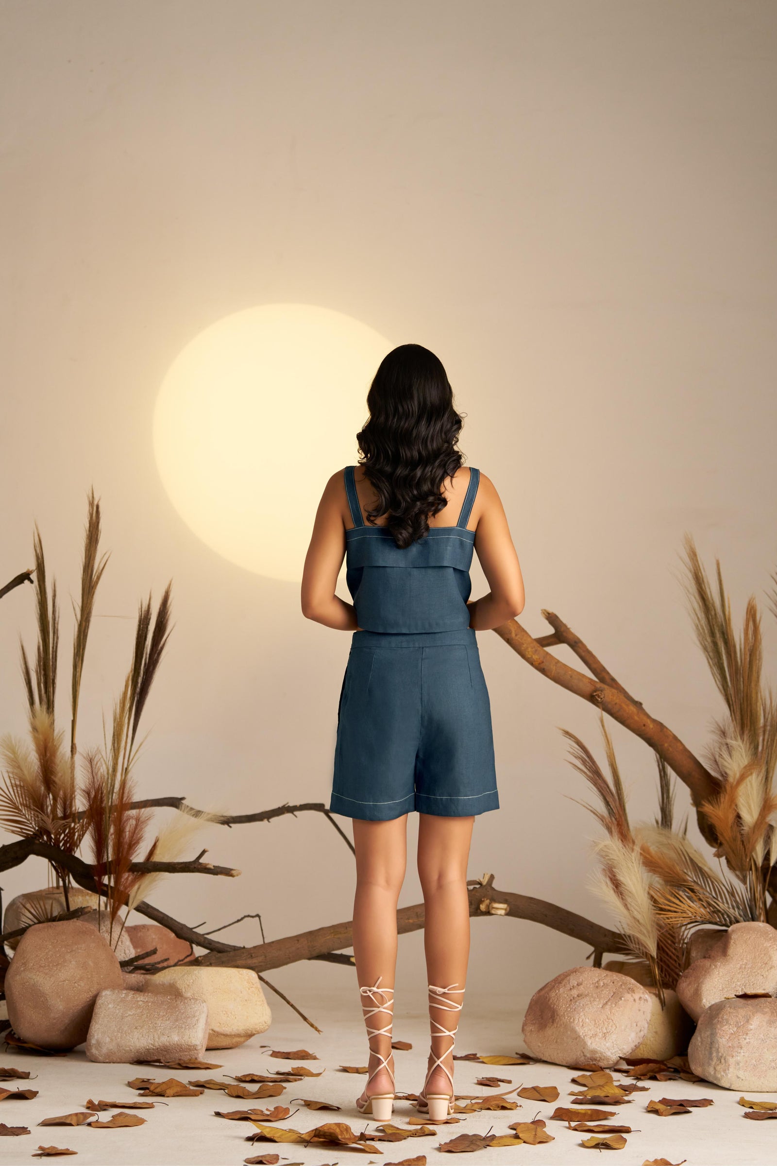 A Trendy Midnight Blue Crop Top With Contrasting White Stitch Detailing