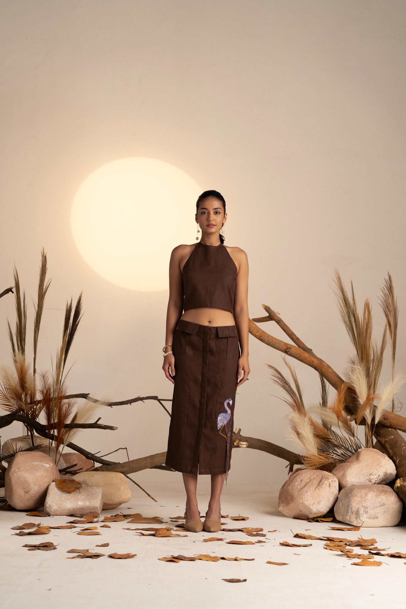 A Sleek Pencil Skirt, Featuring a Cute Flamingo Embellishment For a Fun, Whimsical Touch