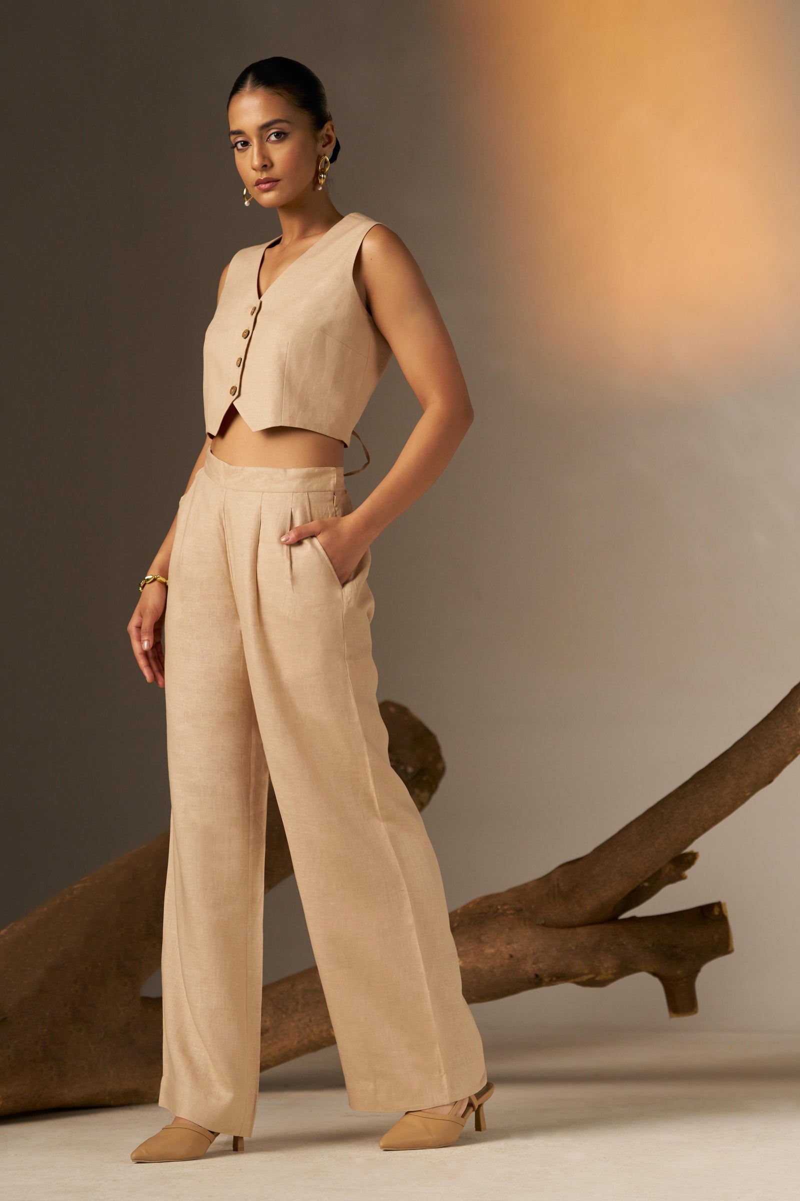 A Sleek And Sophisticated Soft Cosmic Latte Hue, Featuring A Tailored Pant