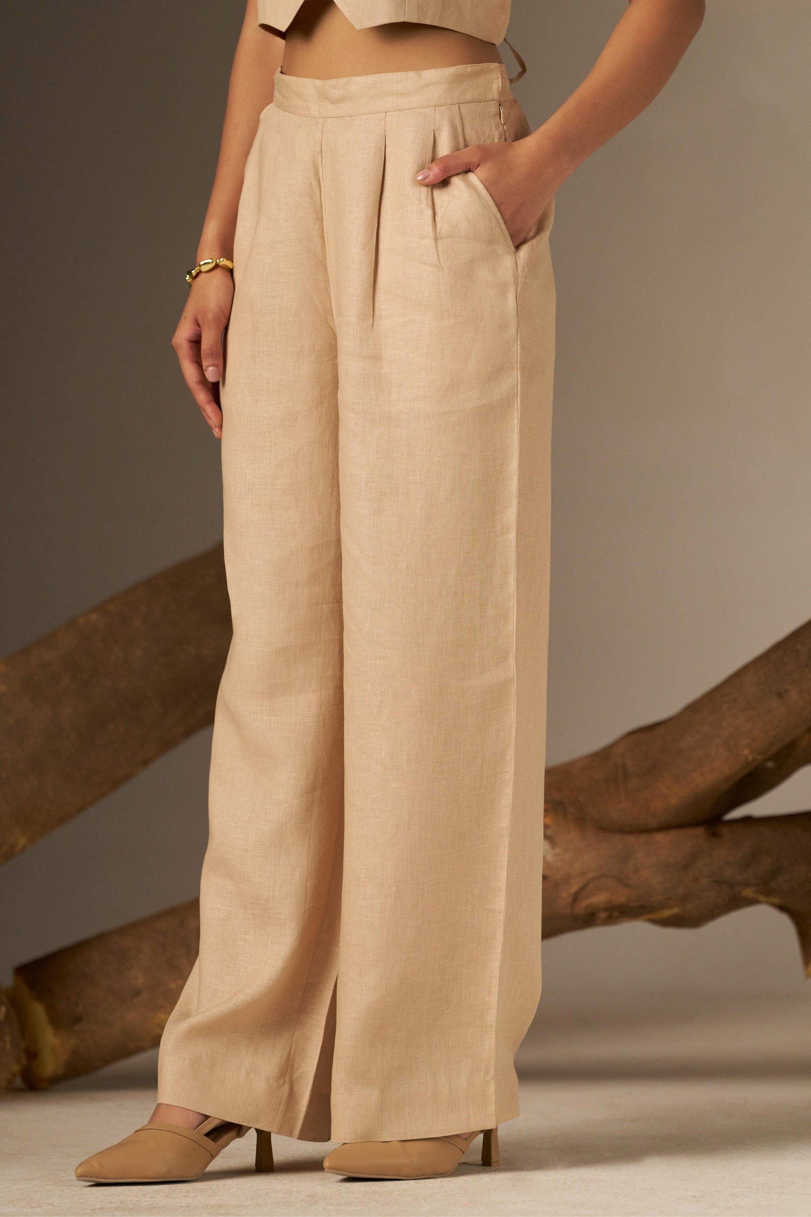 A Sleek And Sophisticated Soft Cosmic Latte Hue, Featuring A Tailored Pant