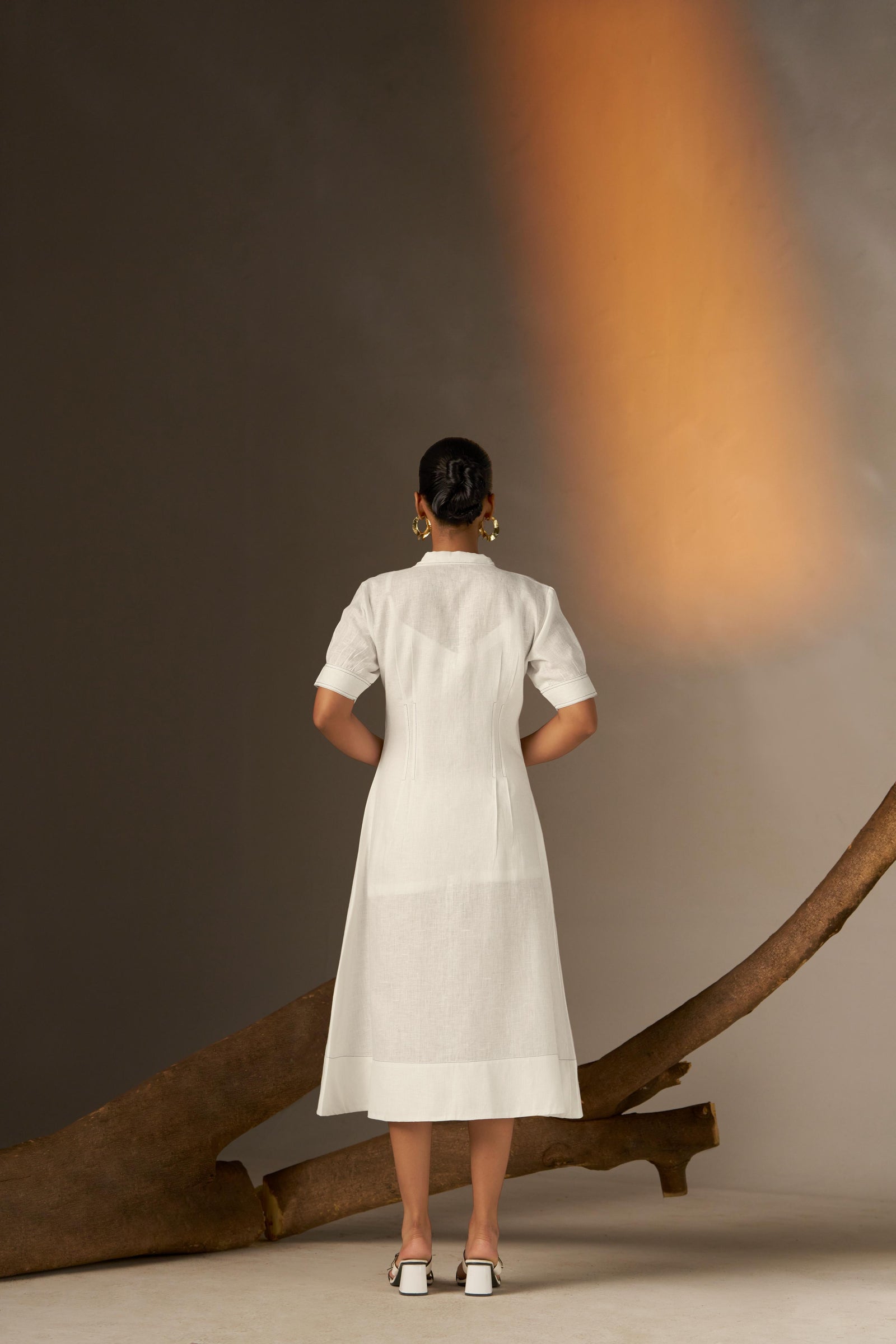 A Timeless White Mid-Length Shirt Dress