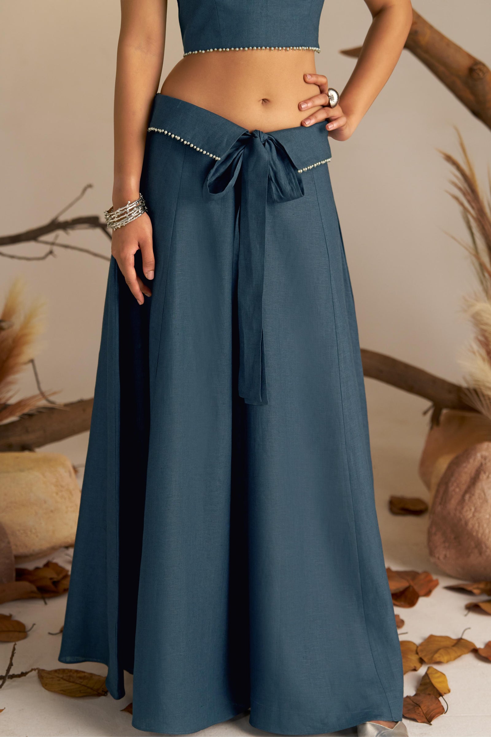 Flattering A-line Skirt, Featuring An Elegant Pearl Embellished Highlight At The Waist