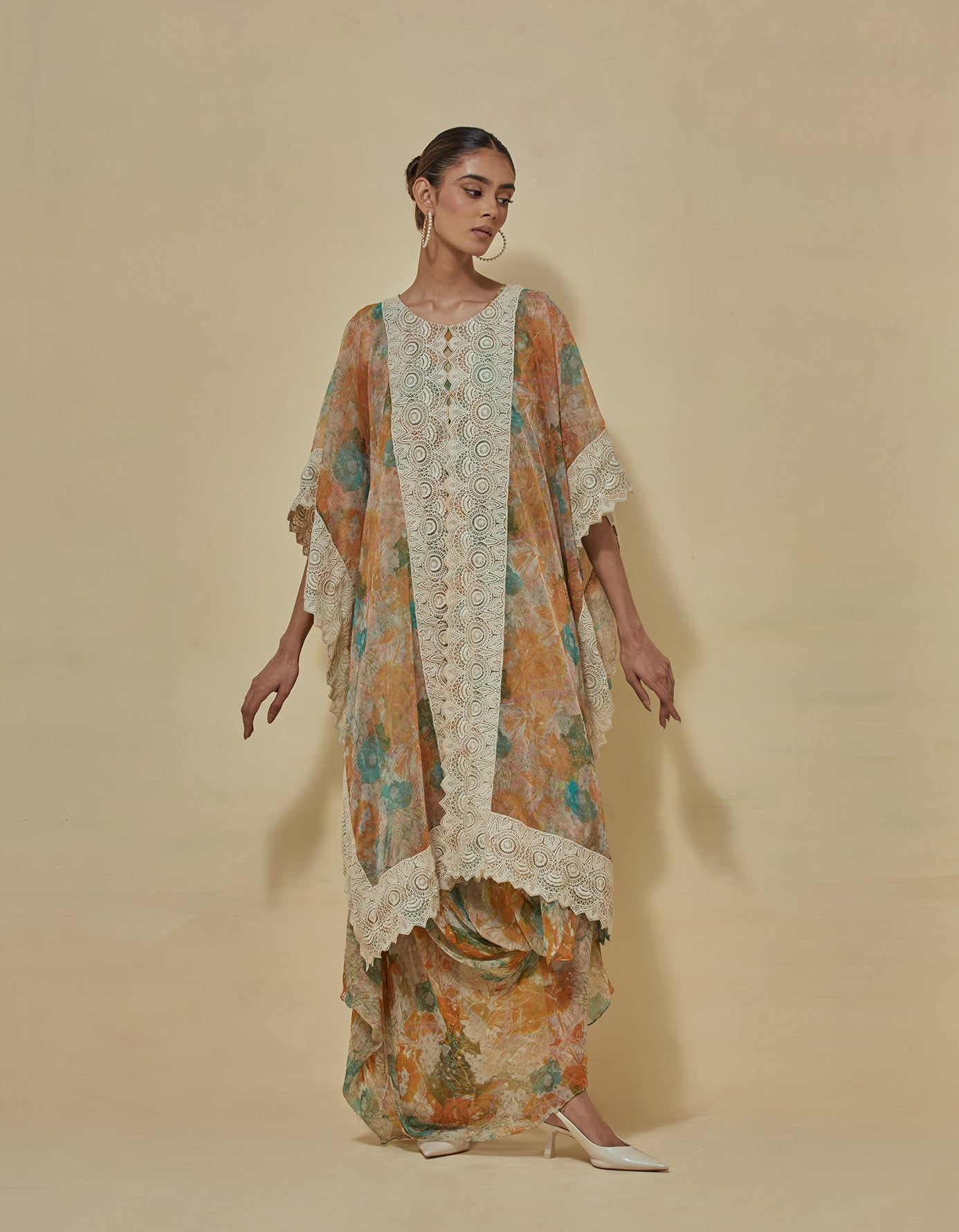 Chiffon printed dress paired with organza cape in thread embroidery border