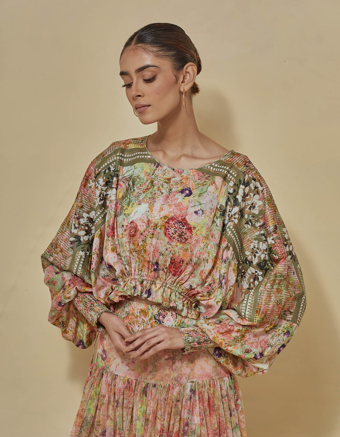 Crop printed top paired with printed gathered skirt in mesh