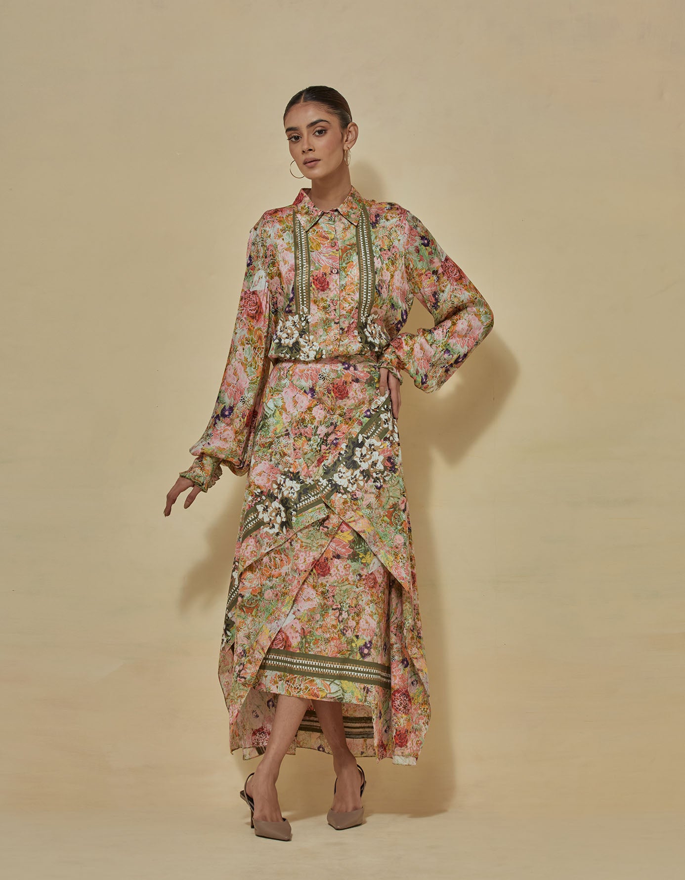 Printed satin shirt paired with draped printed skirt