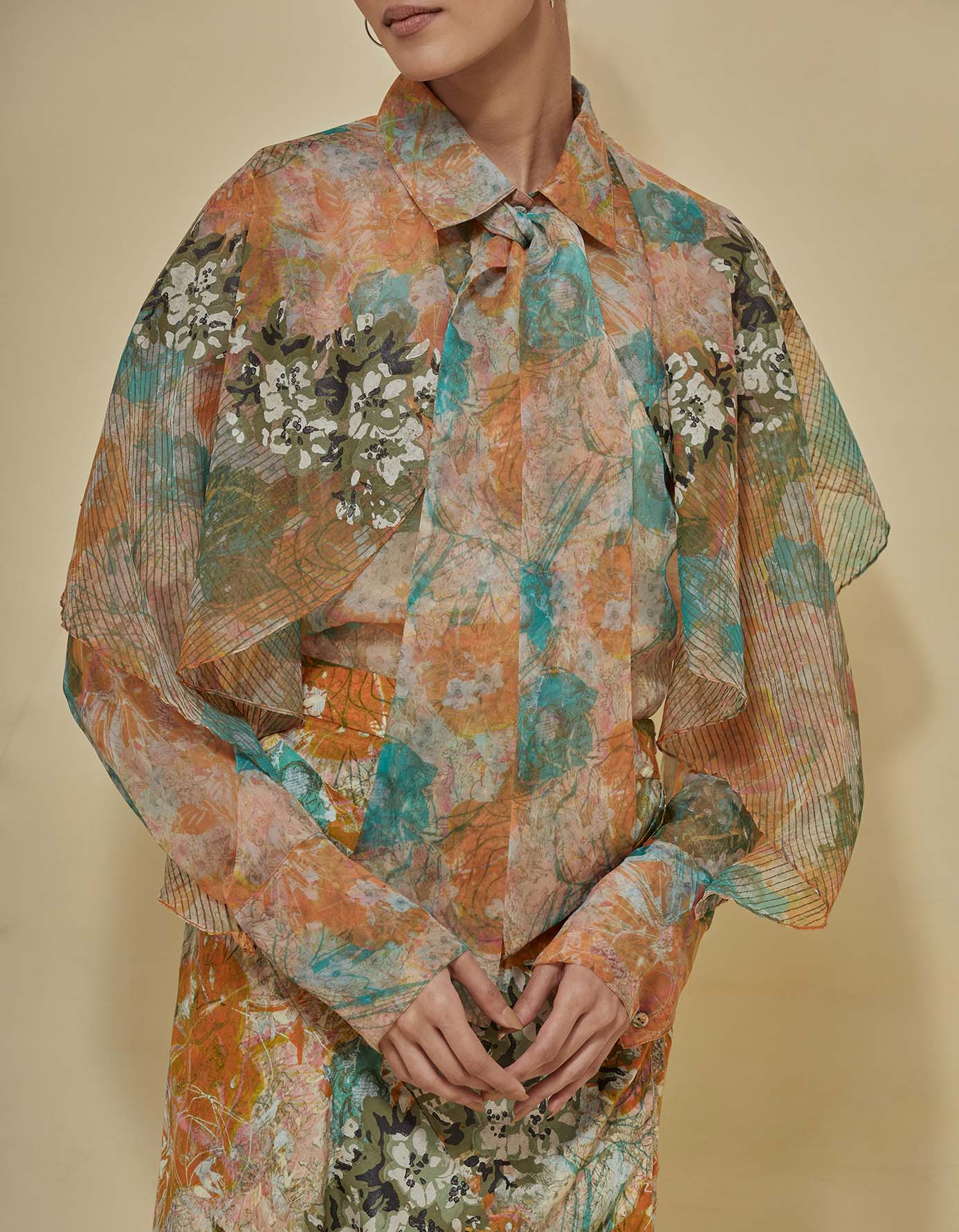 Organsa printed shirt paired with draped printed skirt