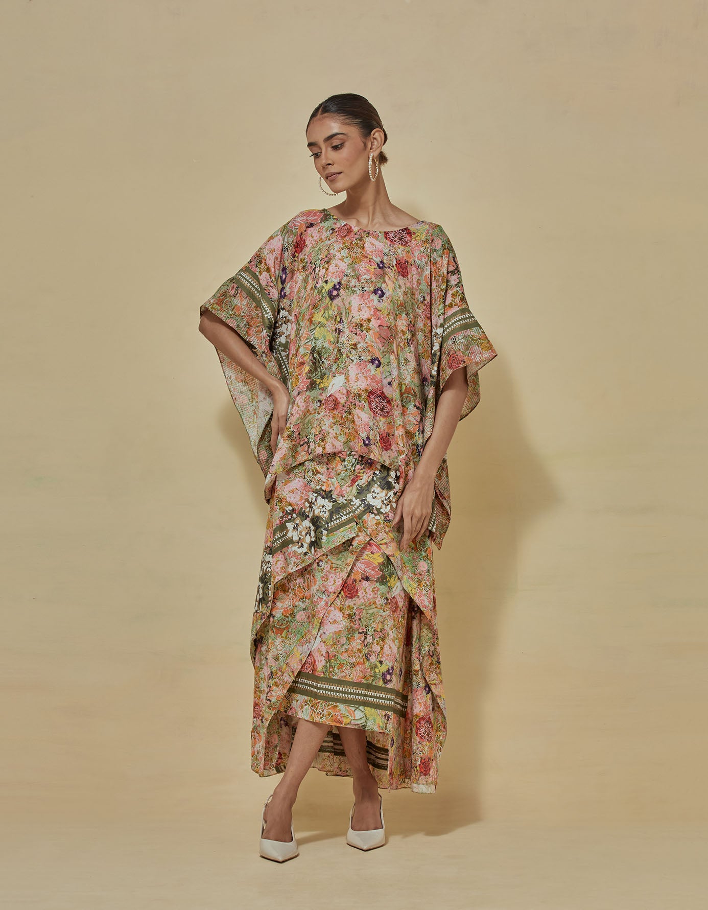 Printed kaftan top paired draped printed skirt