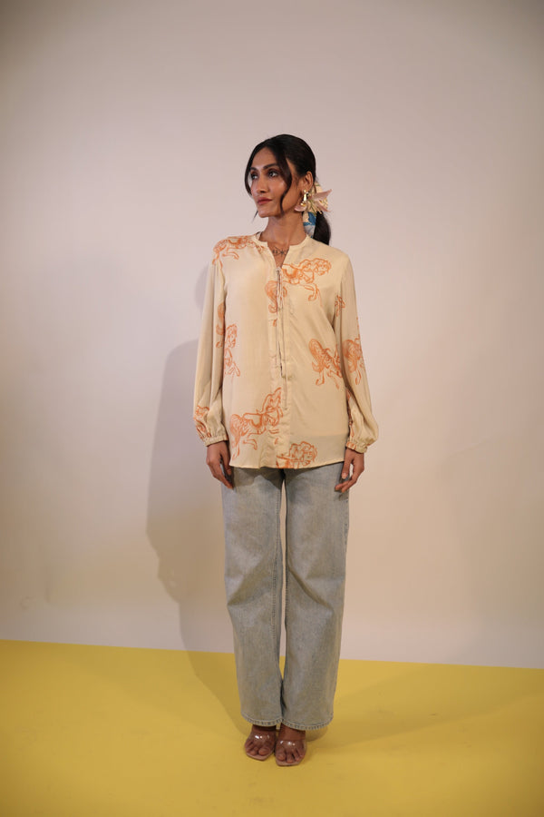 beige & orange hourse outline top