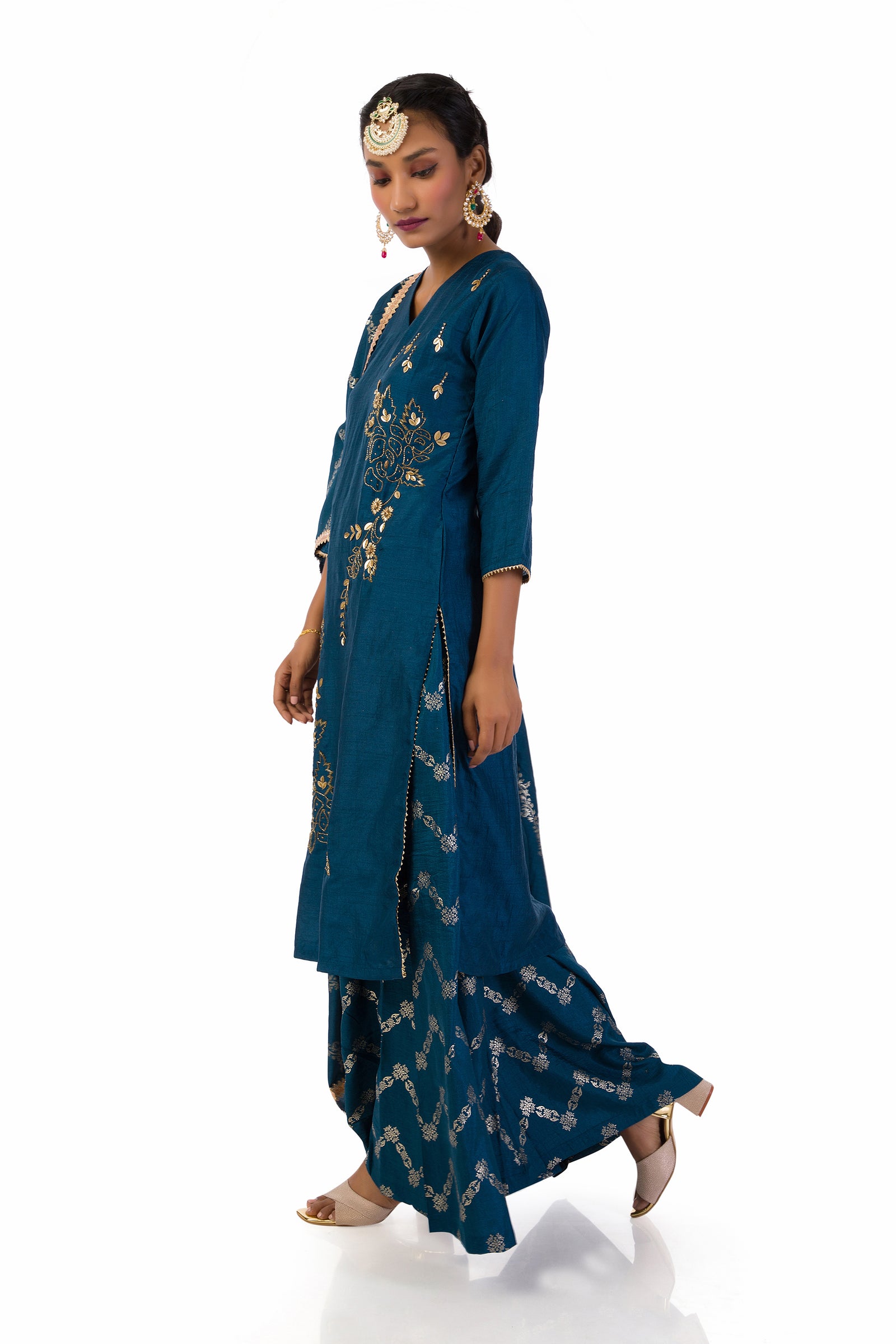 Dark blue suit set with hand embroidered and hand print kurta fully lined.