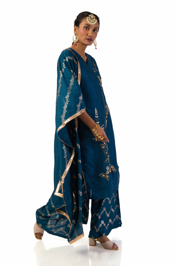 Dark blue suit set with hand embroidered and hand print kurta fully lined.