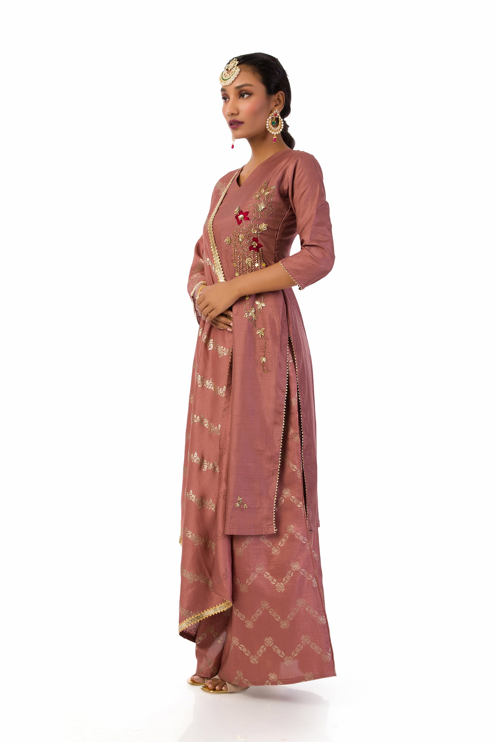 Mauve suit set with hand embroidered and hand  print kurta fully lined.