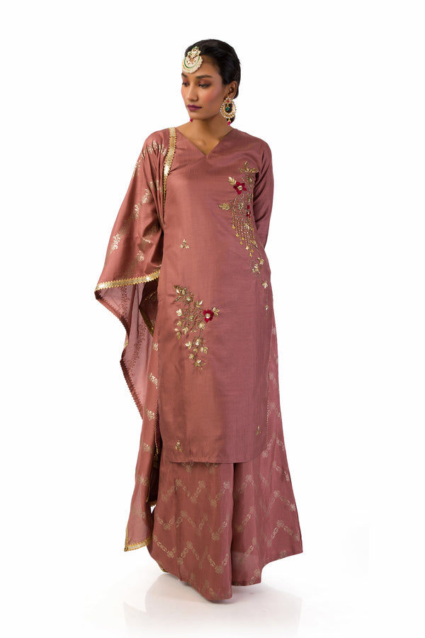 Mauve suit set with hand embroidered and hand  print kurta fully lined.