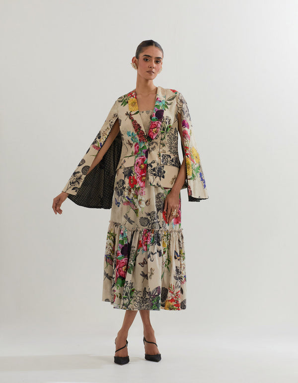 Botanical printed cotton tiered skirt paired with jacket and bustier