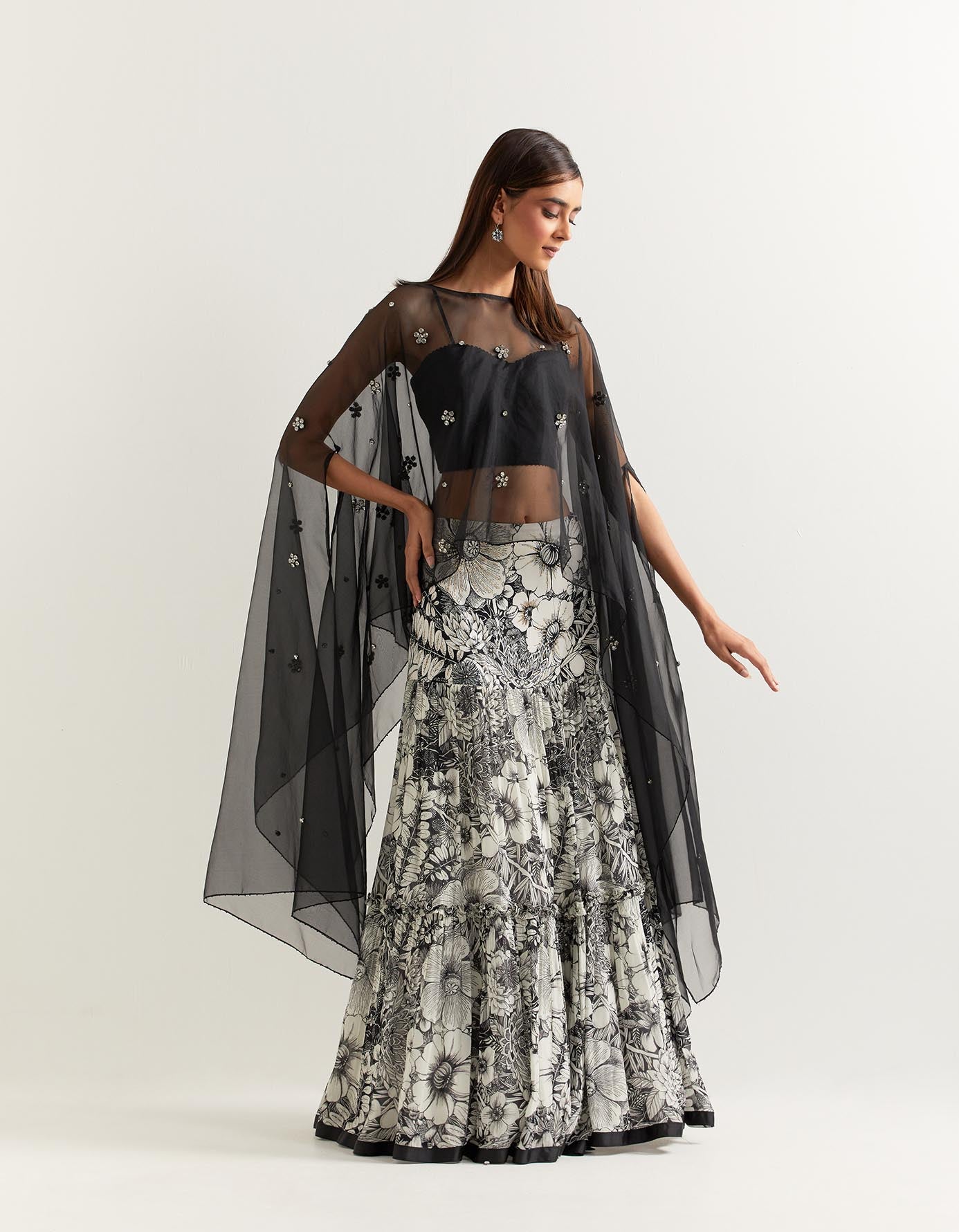 Organza dupatta cape embellished with stone work paired with printed georgette skirt