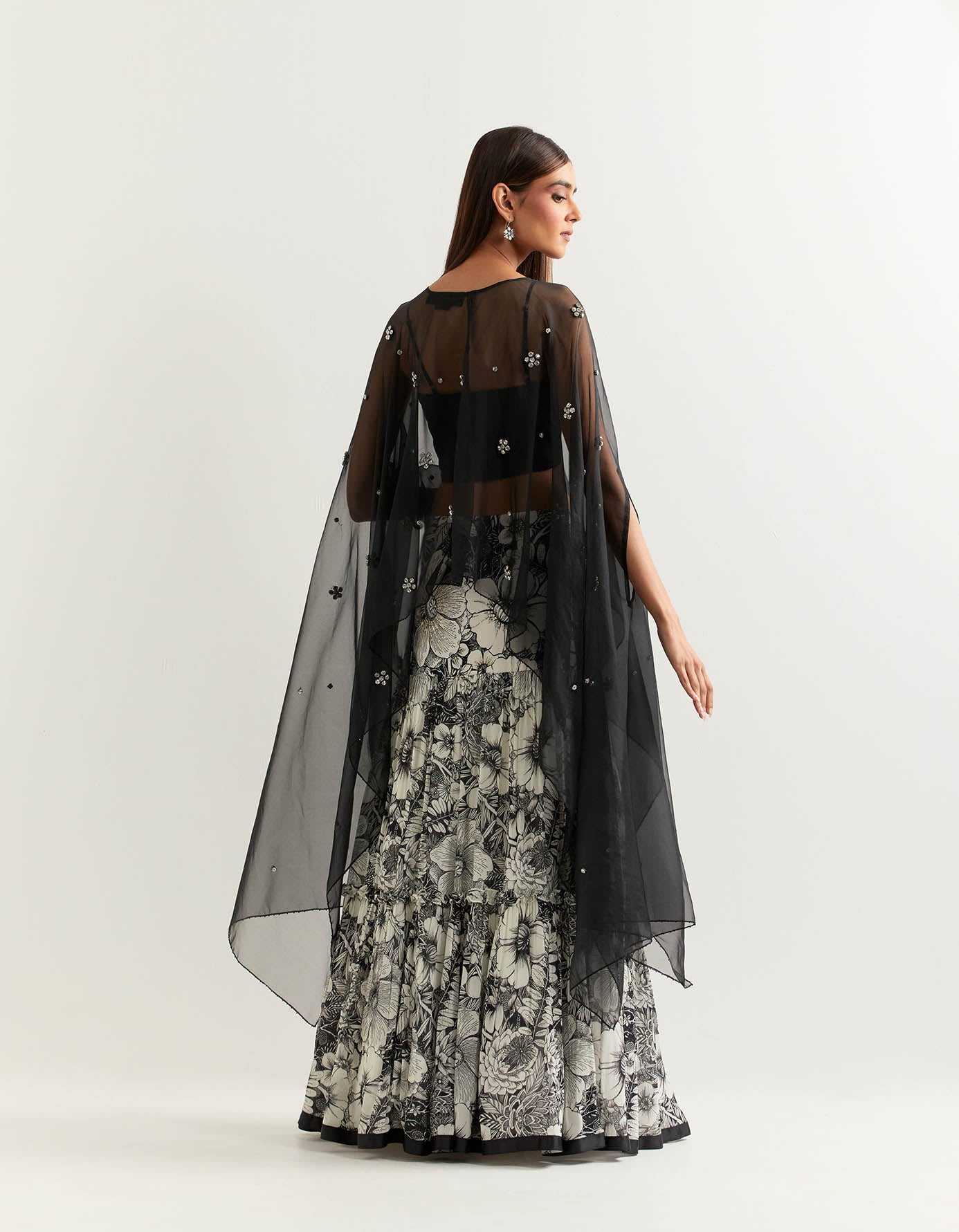 Organza dupatta cape embellished with stone work paired with printed georgette skirt