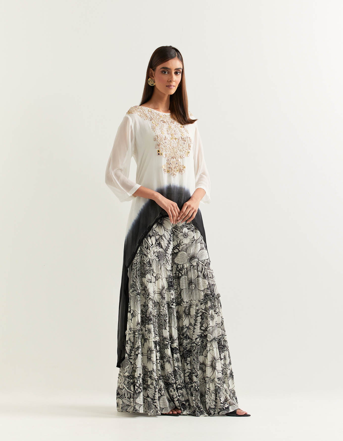 Ivory and black hand embellished high low tunic paired with printed gharara