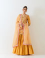 Mustard yellow sharara set in exquisite hand embroidery and tie dye dupatta