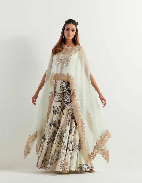 Saaya printed chanderi pants paired with organza silk hand embroidery cape and steretch inner