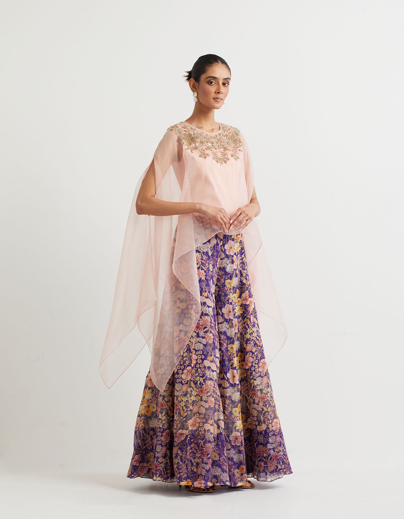 Printed penelled sharara with textured bottom paired with hand embroidered dupatta cape