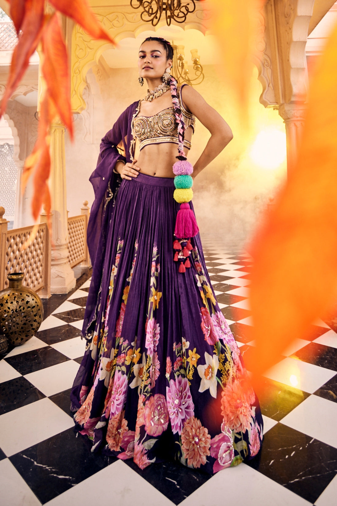 A Purple Floral Printed Embroidered Lehenga Set Combined With Heavy Embroidered Blouse And Dupatta.
