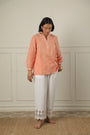 A Top Adorned With Delicate Embroidery