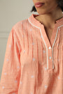 A Top Adorned With Delicate Embroidery
