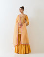 Mustard yellow sharara set in exquisite hand embroidery and tie dye dupatta