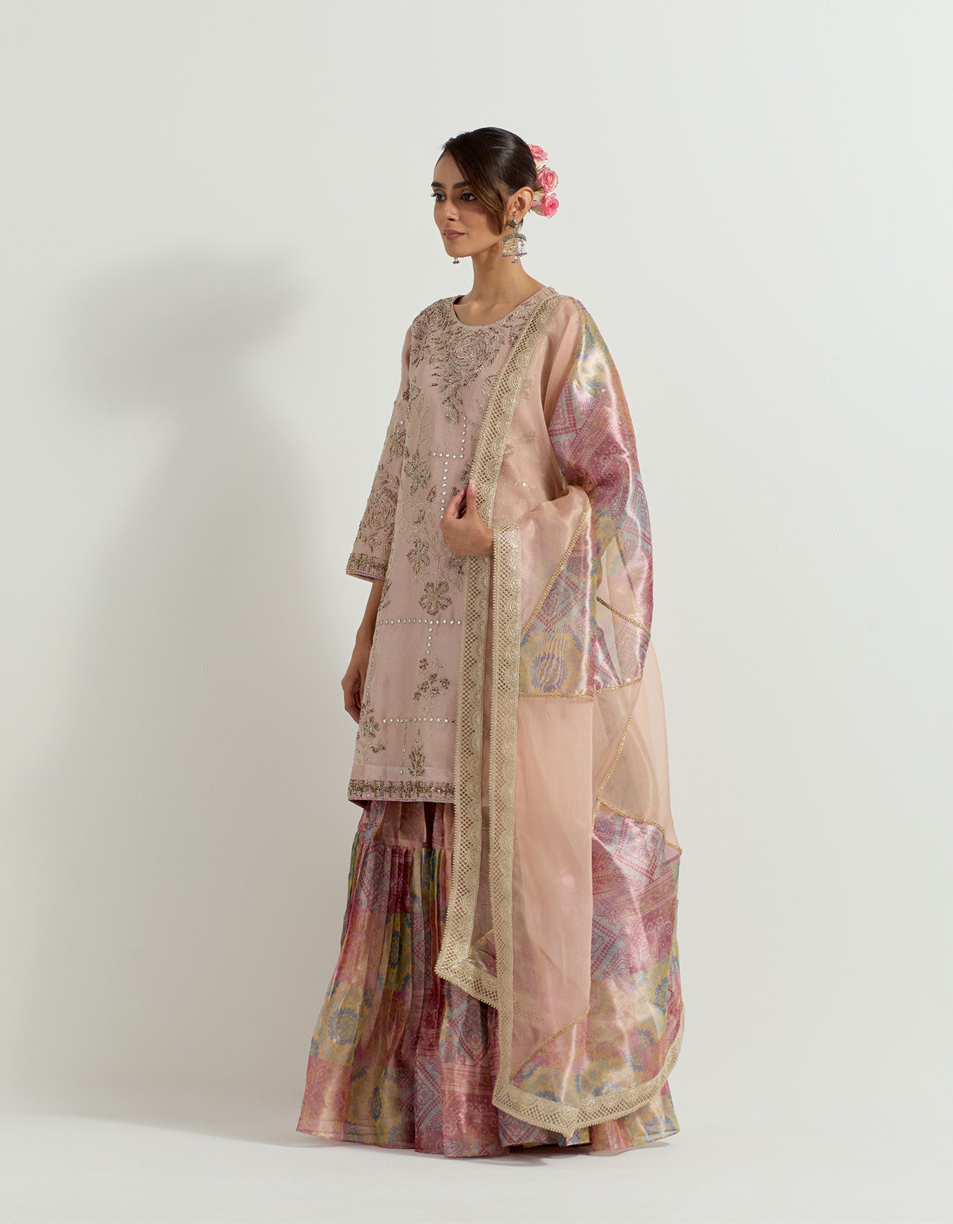 Tissue hand embellished long tunic paired with tissue bandhini printed  pleated sharara and organza and tissue patch work dupatta