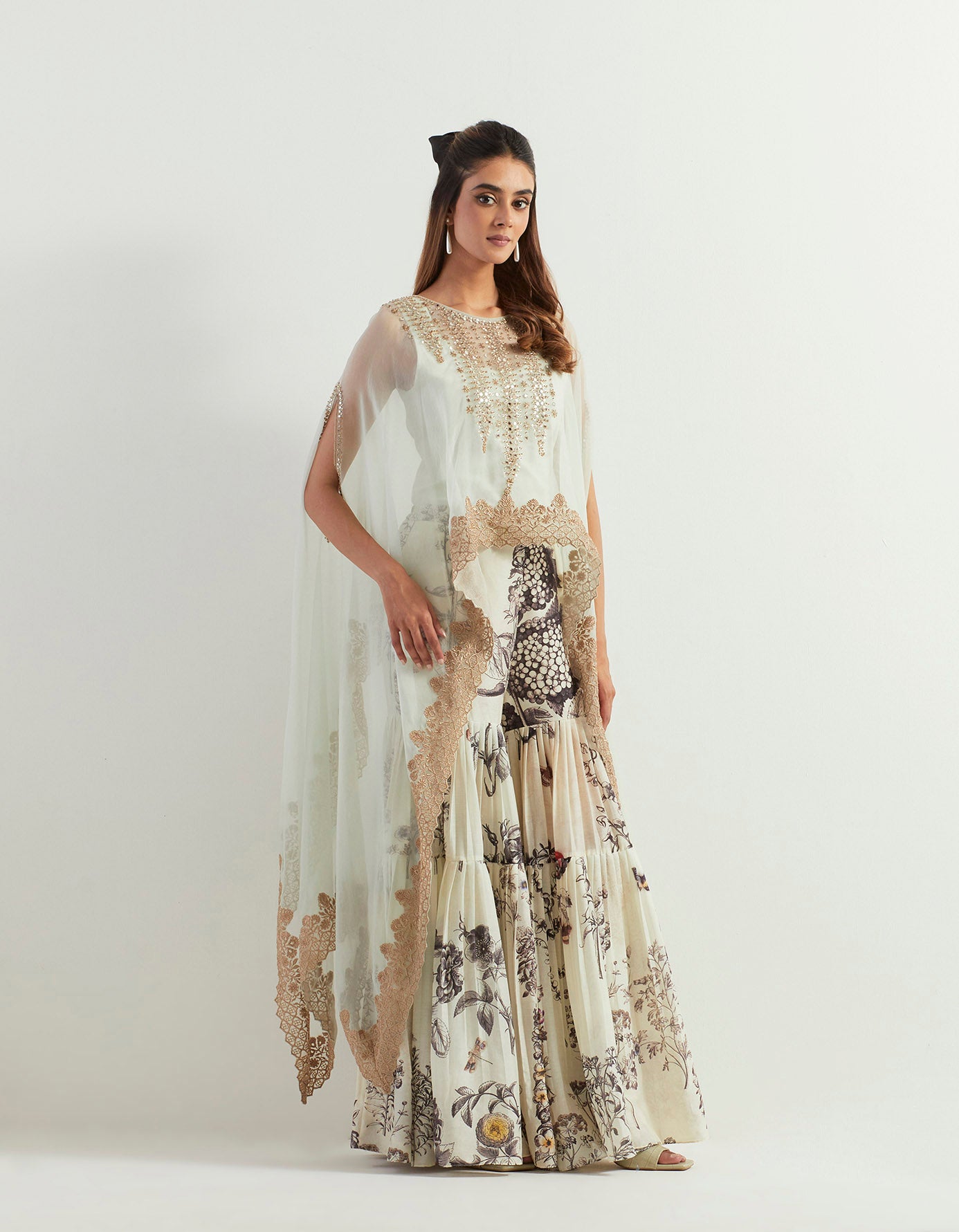 Saaya printed chanderi pants paired with organza silk hand embroidery cape and steretch inner