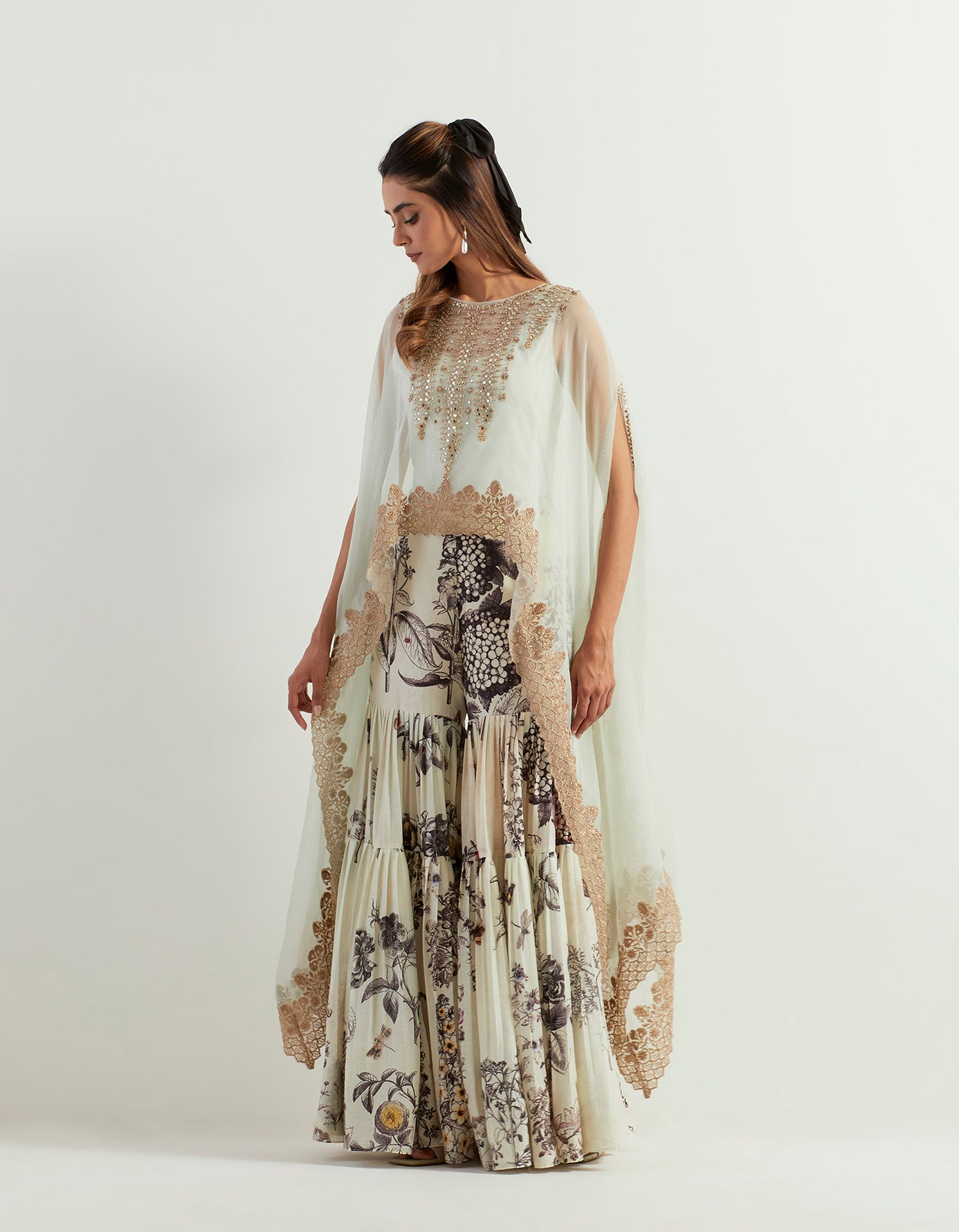 Saaya printed chanderi pants paired with organza silk hand embroidery cape and steretch inner