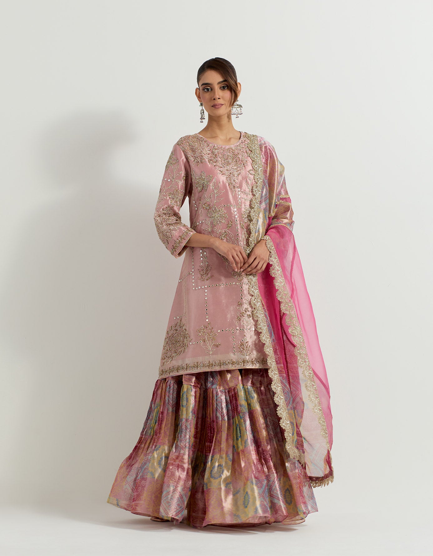 Fuchsia tissue hand embellished long tunic paired with tissue bandhini printed  pleated sharara and organza and tissue patch work dupatta