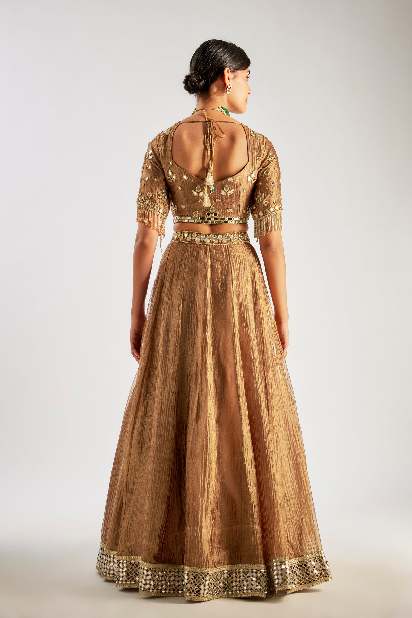 Gold Lehenga In Crushed Silk Tissue Base With Hand Embroidery
