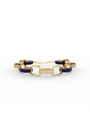 22kt gold plated Link bracelet with white crystals and green enamel.