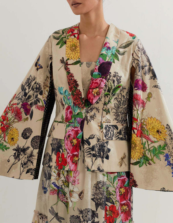 Botanical printed cotton tiered skirt paired with jacket and bustier