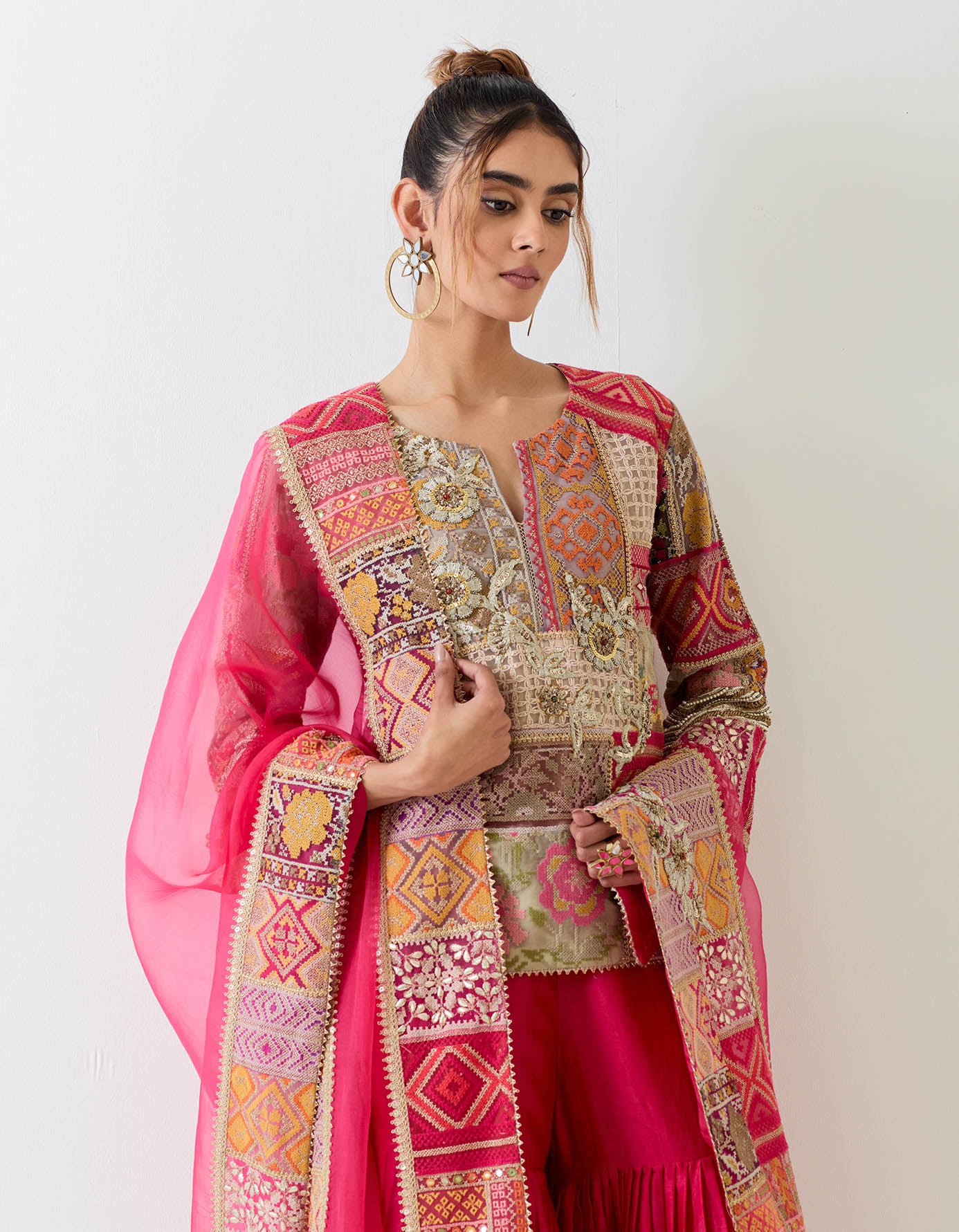 Patch work kurti and dupatta paired with pleated chanderi silk sharara