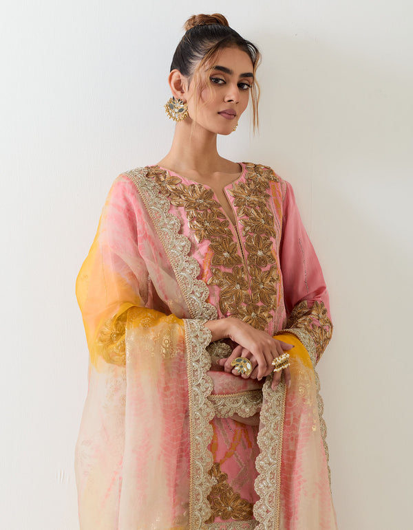 Chanderi silk embroidered kurti top paired with pleated sharara and organza tie dye dupatta