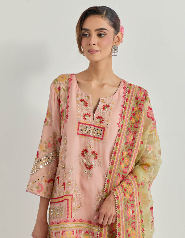 Tissue chanderi kurti and sharara in cross stitch and mirror work embroidery paired with organza silk embroidered dupatta