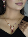 Moissanite Pendant Set With Red Stones