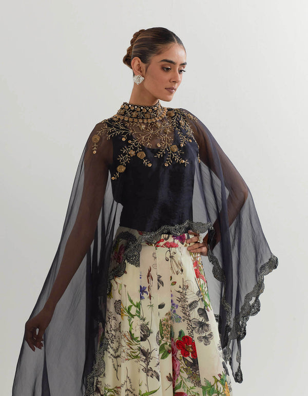 Organza dupatta cape paired with stretch inner and botanical printed sharara