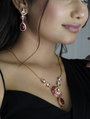 Moissanite Pendant Set With Red Stones