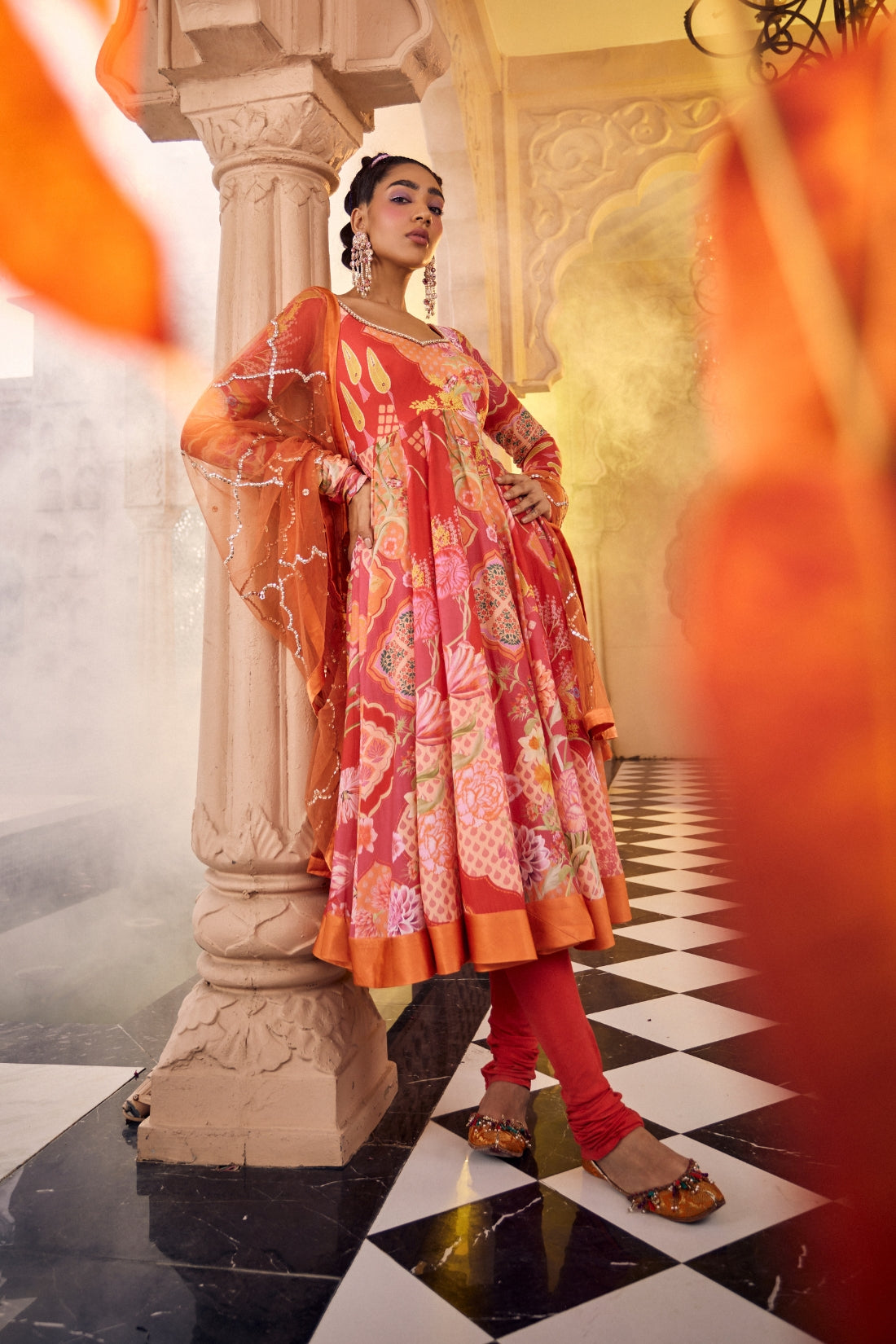 Red Multi-Printed Anarkali Featuring Intricate Kangdi Work On The Neckline