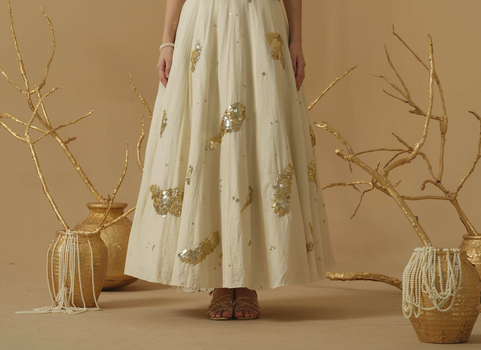 A Flared Skirt Having Scattered Geometrical Embellishment