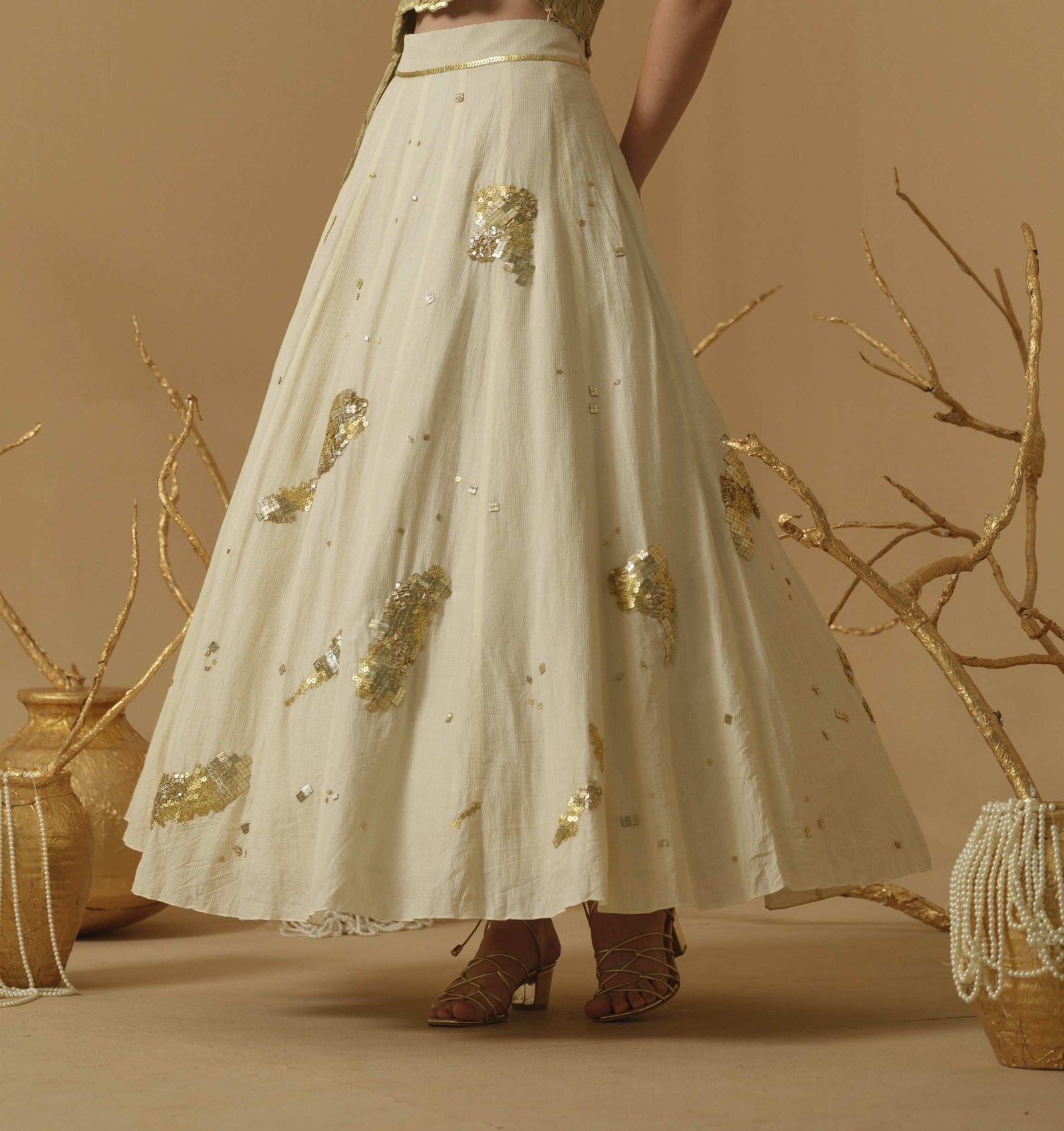 A Flared Skirt Having Scattered Geometrical Embellishment
