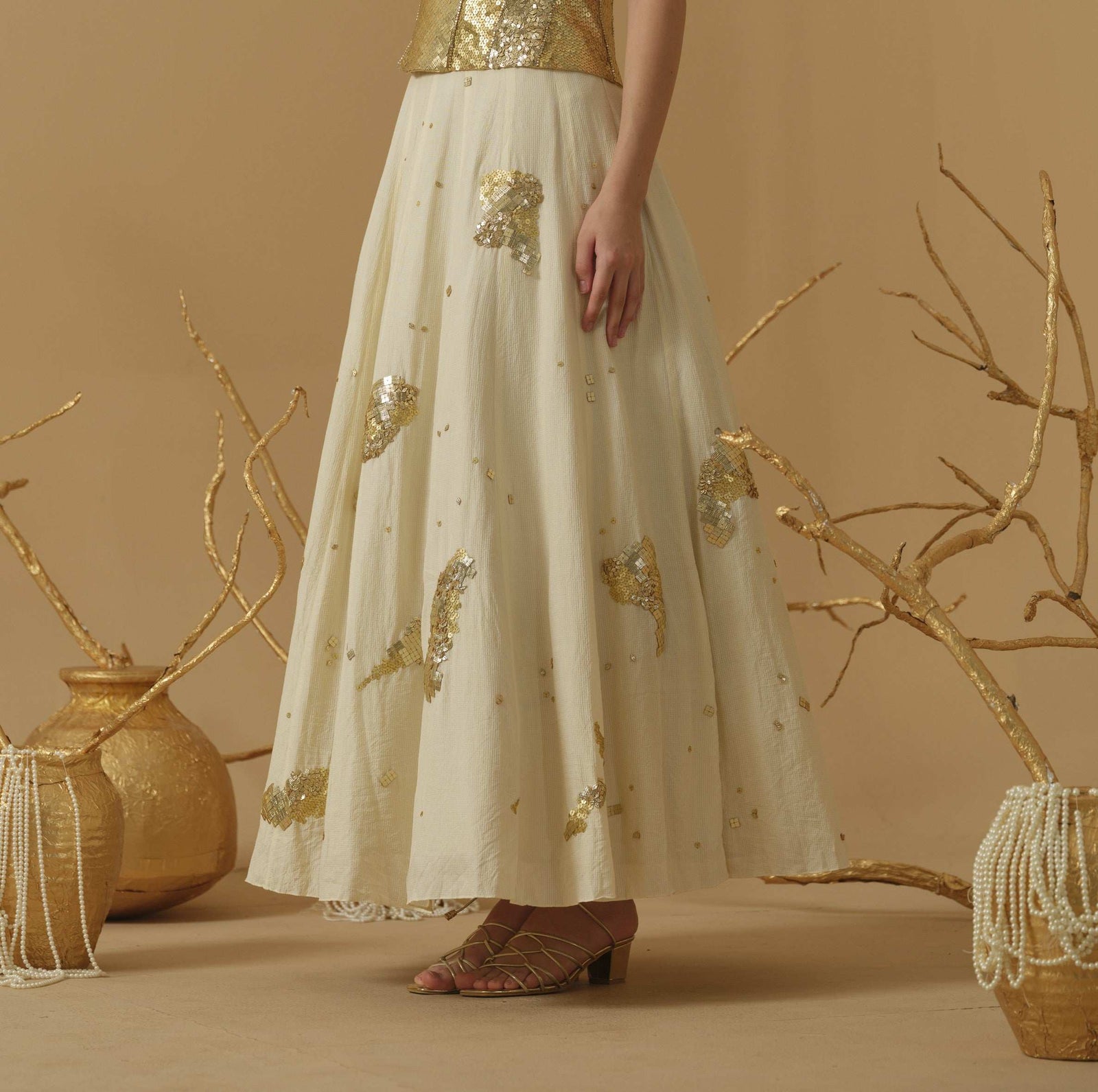 A Flared Skirt Having Scattered Geometrical Embellishment
