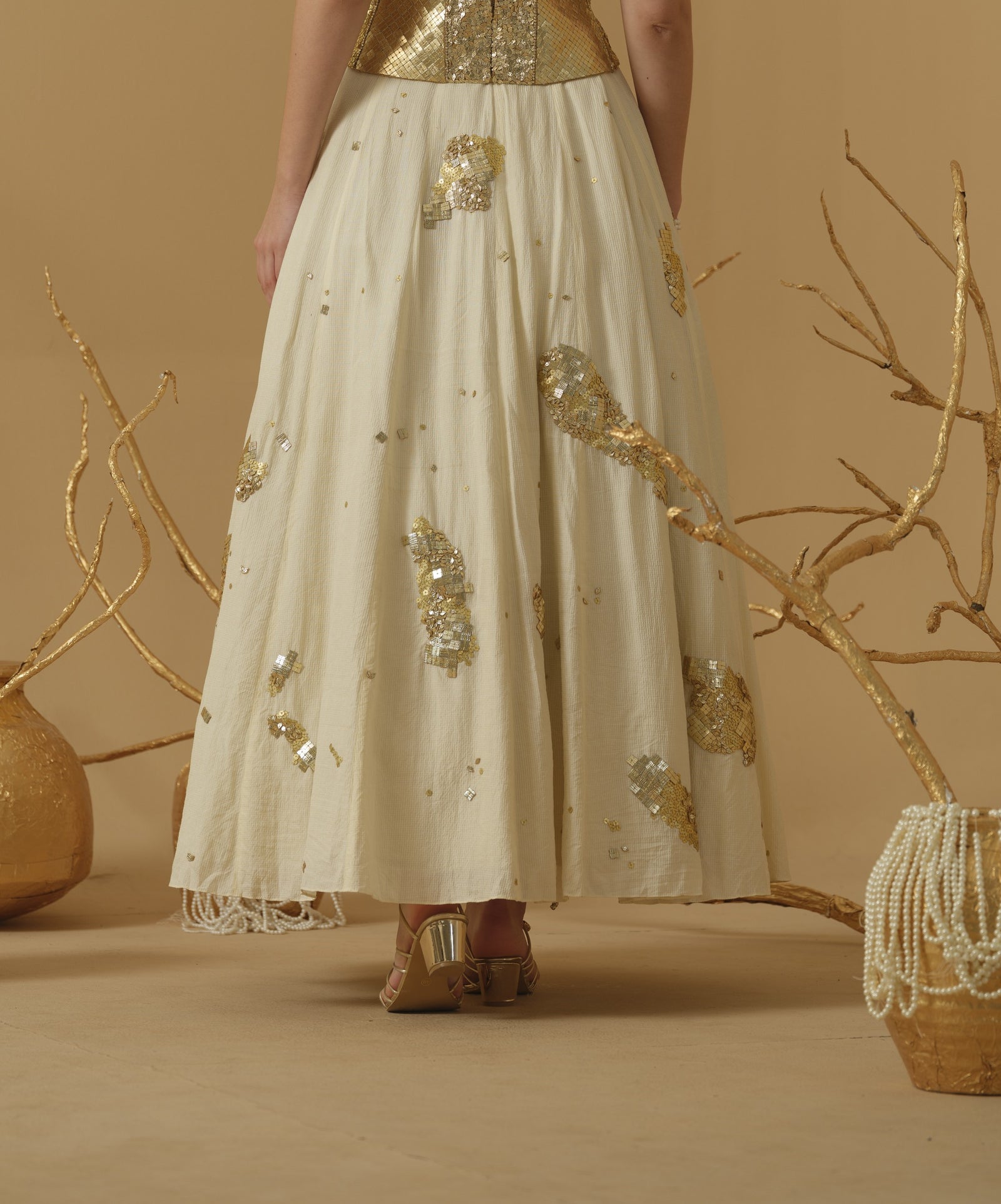 A Flared Skirt Having Scattered Geometrical Embellishment
