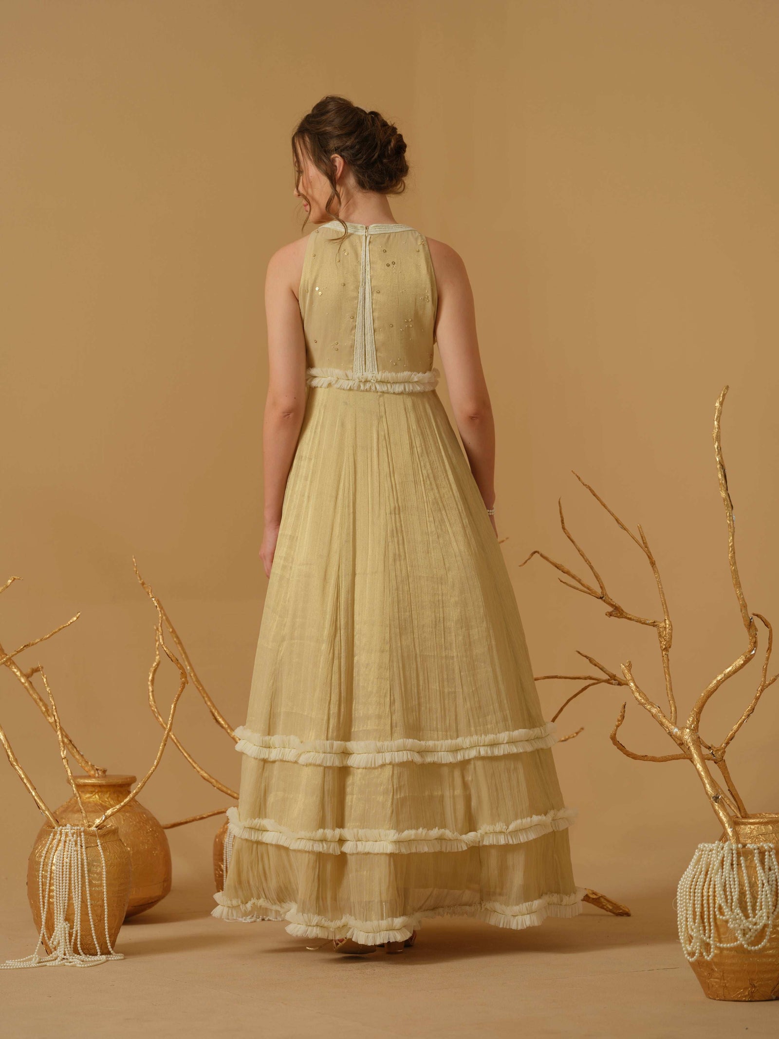 A Close Neck Full Length Dress  Having  Embroidery  On The Bodice