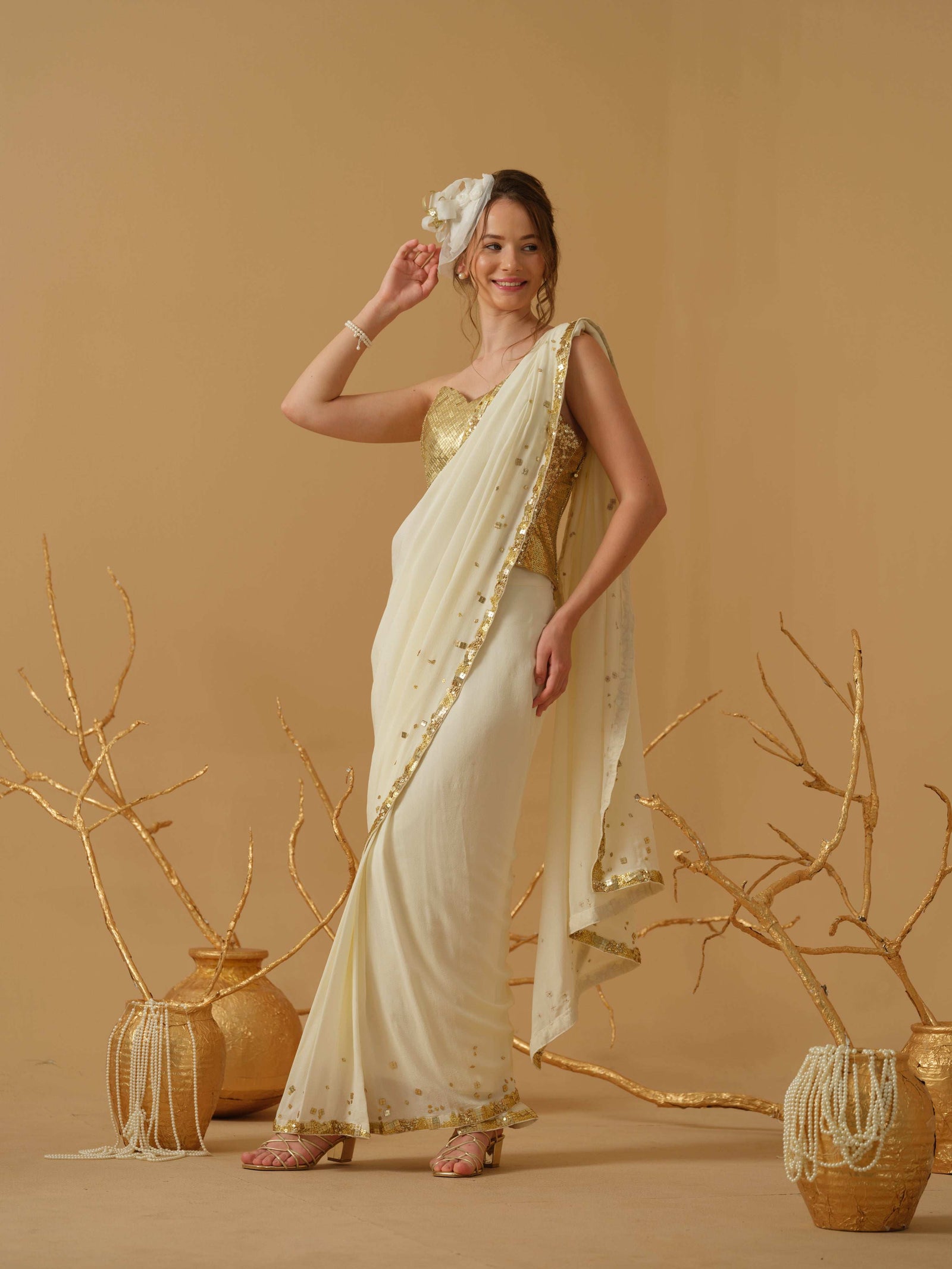 A Pre-Stitched Saree With A Geometrical Sequins Border