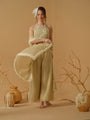 A Halter Neck Blouse Having  Floral Embroidery  Paired With Culotte Pant