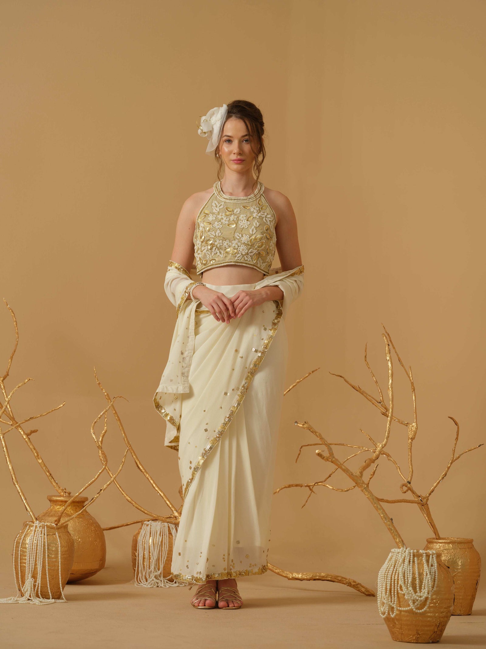 A  Halter Neck Blouse Having  Floral Embroidery